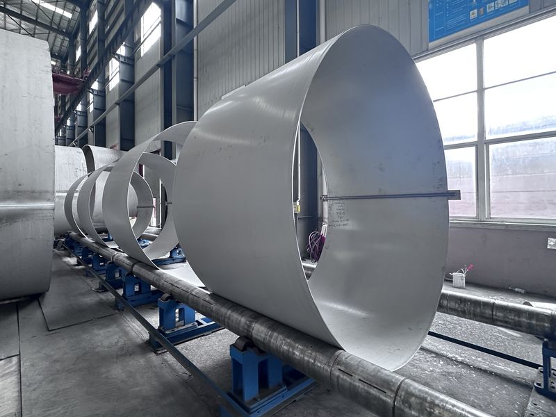 Stainless-steel shell courses on the roller line